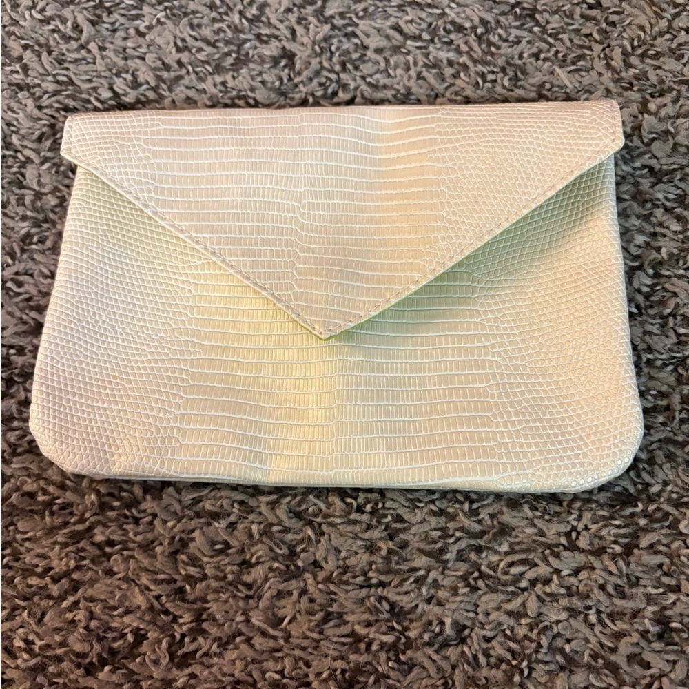 8 Small adorable Ipsy makeup bags. - Picture 2 of 9